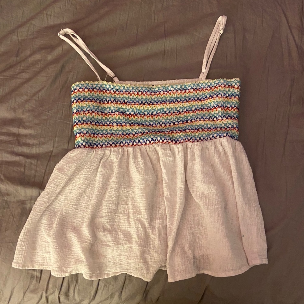 white and colored tank top